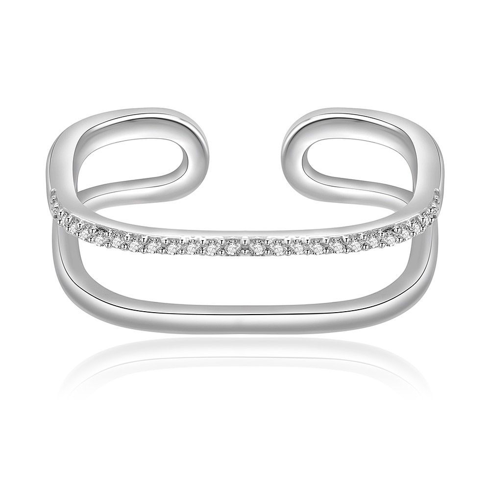 A close-up of a rhodium-plated cuff bracelet with channel-set cubic zirconia, showcasing the craftsmanship of JR Fashion Accessories.