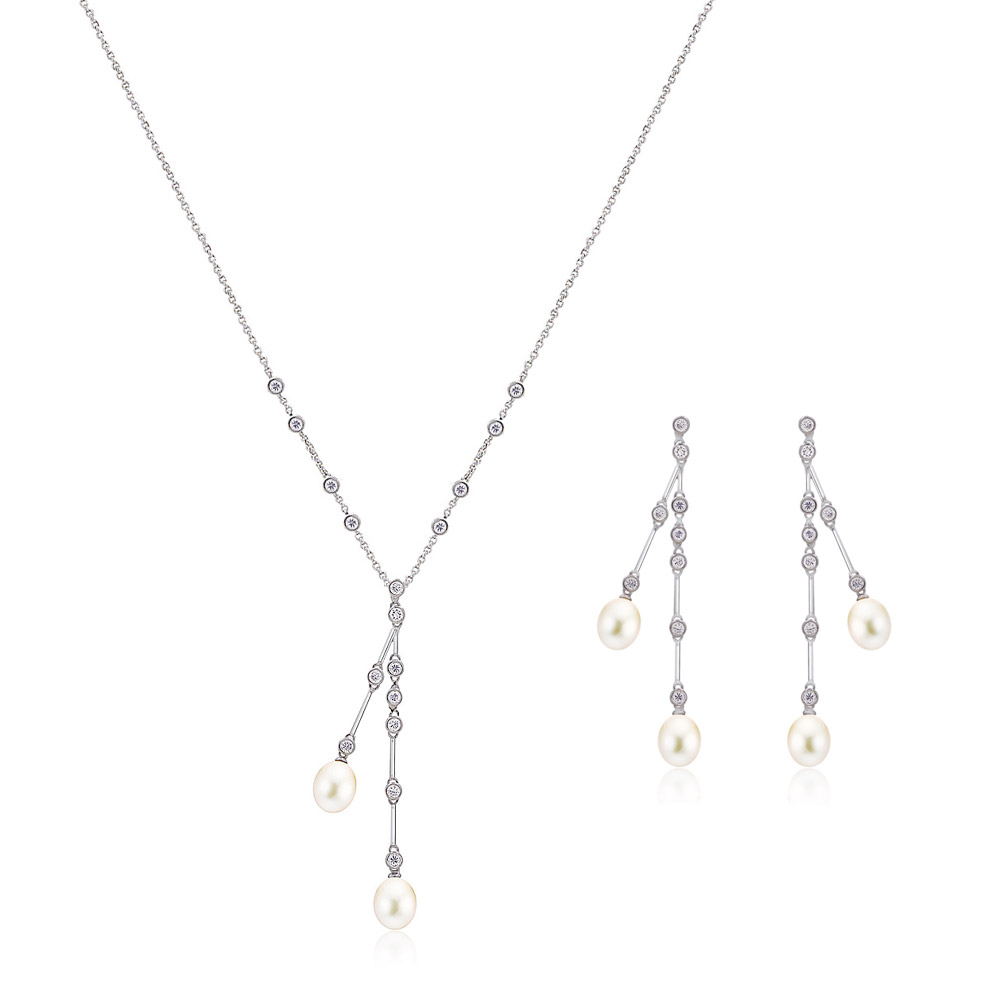 Wholesale Pearl Bridal Jewelry Set JRS-005, showcasing a rhodium-plated necklace and stud earrings adorned with elegant pearls and sparkling cubic zirconia.