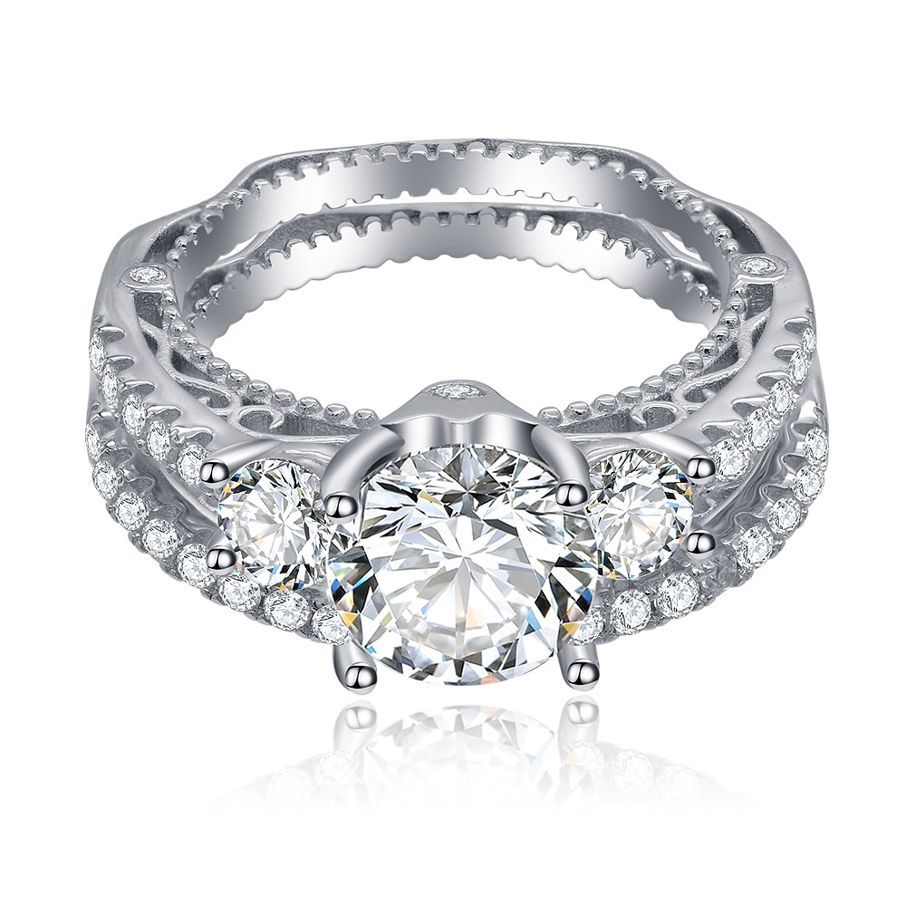 Elegant Princess Cut Halo Bridal Ring Set in 925 Sterling Silver, featuring a prominent central cubic zirconia surrounded by accent stones.