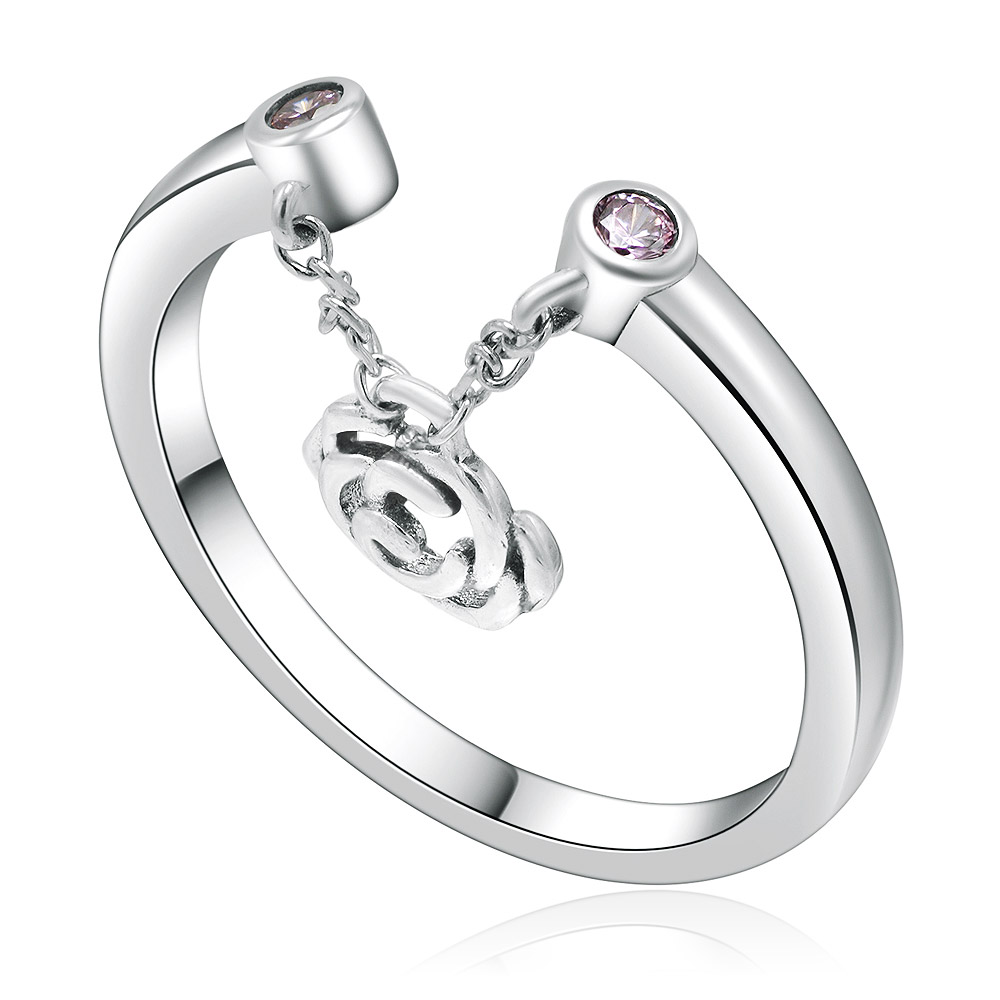 A close-up of the Rose Dangle 925 Sterling Silver Ring, showcasing its intricate floral design, pink cubic zirconia stone, and the delicate dangling rose charm.