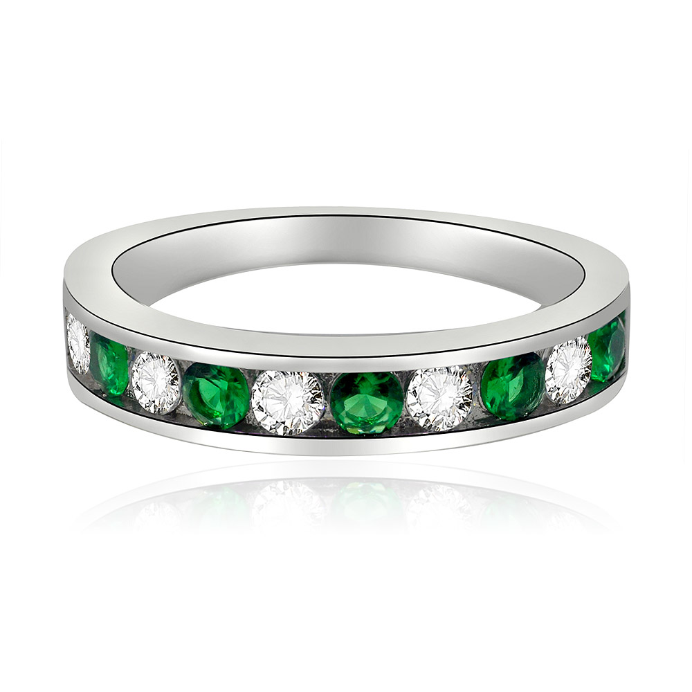 Front view of the Emerald and White Band Ring, featuring alternating green emerald and white cubic zirconia stones set in a polished rhodium-plated brass band.