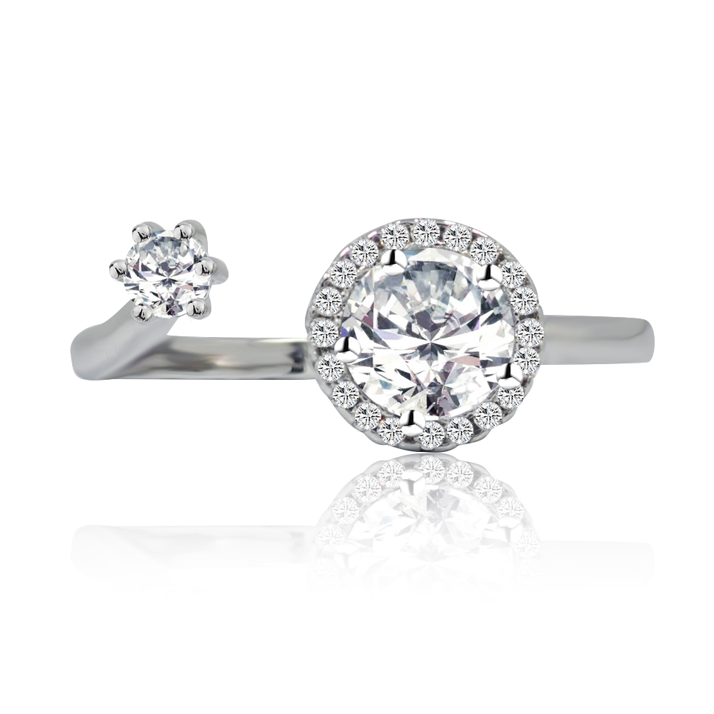 Clawed Round Ring featuring a large, prong-set white cubic zirconia centerpiece with smaller accent stones on a rhodium-plated brass band.