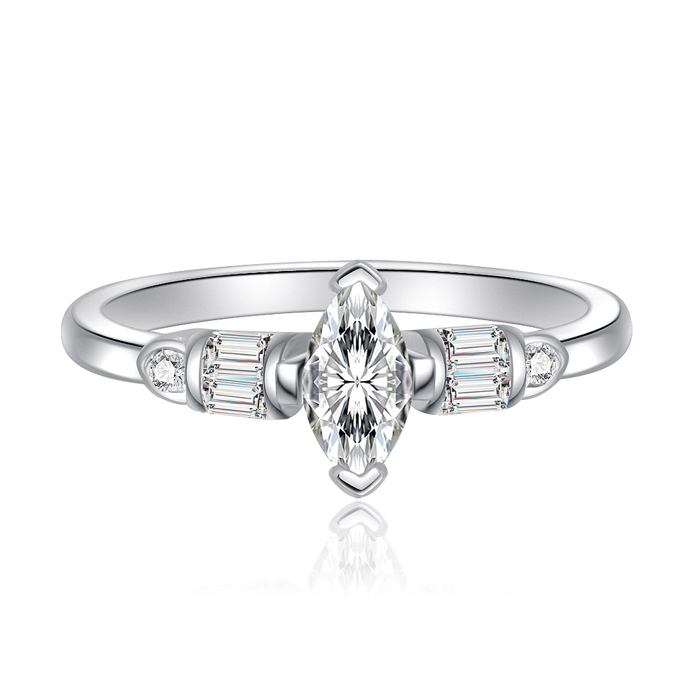 Close-up of an elegant marquise cut cubic zirconia ring with quad baguettes on a silver-toned rhodium-plated band.