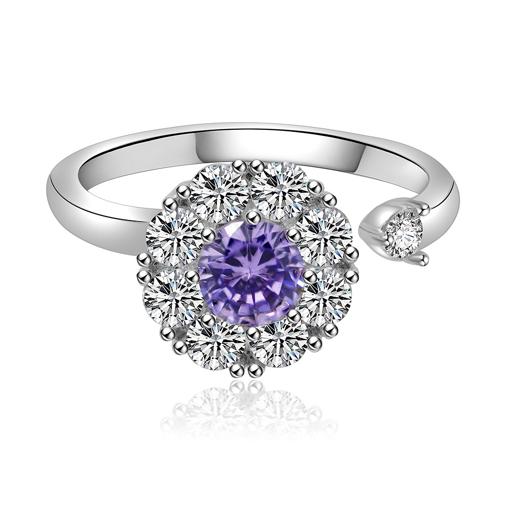 Front view of the Adjustable Spinning Purple Floral Ring, showcasing the central purple cubic zirconia surrounded by a halo of clear stones on a rhodium-plated brass band.