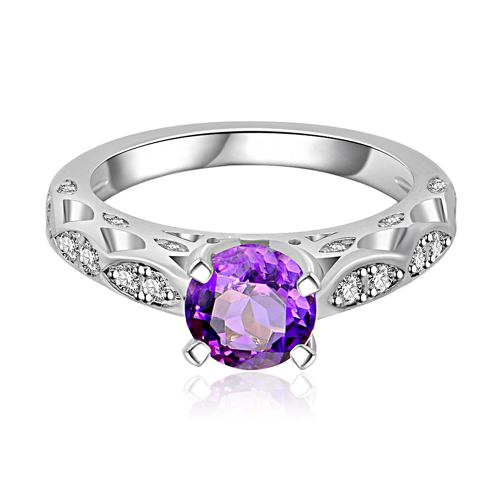 Amethyst Roman Edge Ring featuring a central purple cubic zirconia surrounded by clear gemstones on an ornate, rhodium-plated brass band.