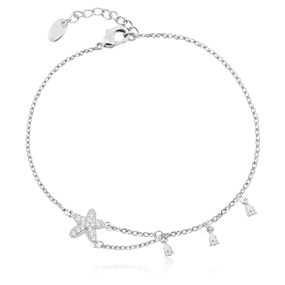 Close-up of the Dainty CZ Starfish Bracelet in Rhodium, showcasing the sparkling cubic zirconia stones on the starfish charm and the delicate brass chain.