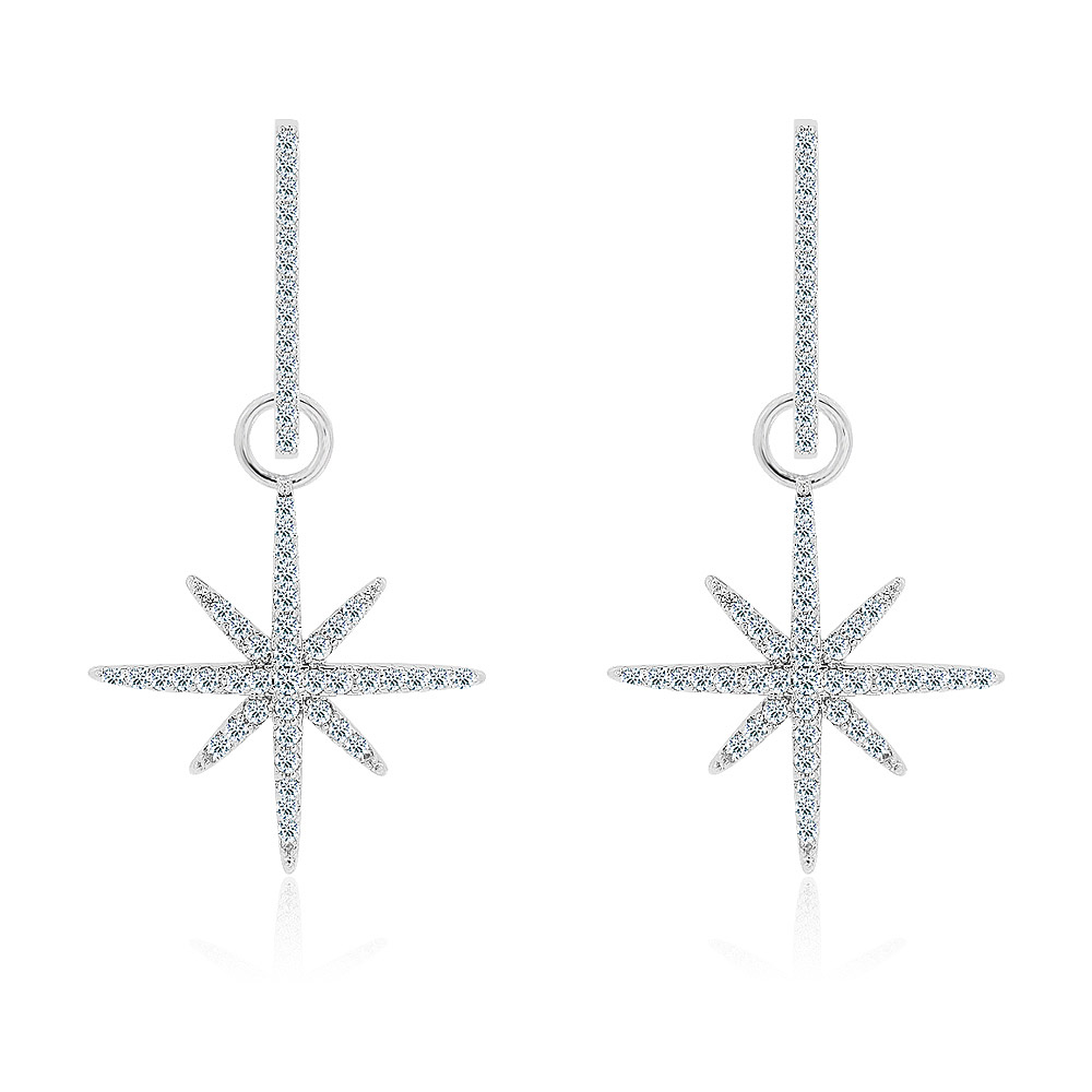 A pair of Silver Pave Diamond Starburst Dangle Earrings, showcasing the intricate starburst design with sparkling cubic zirconia encrustation on a white background.