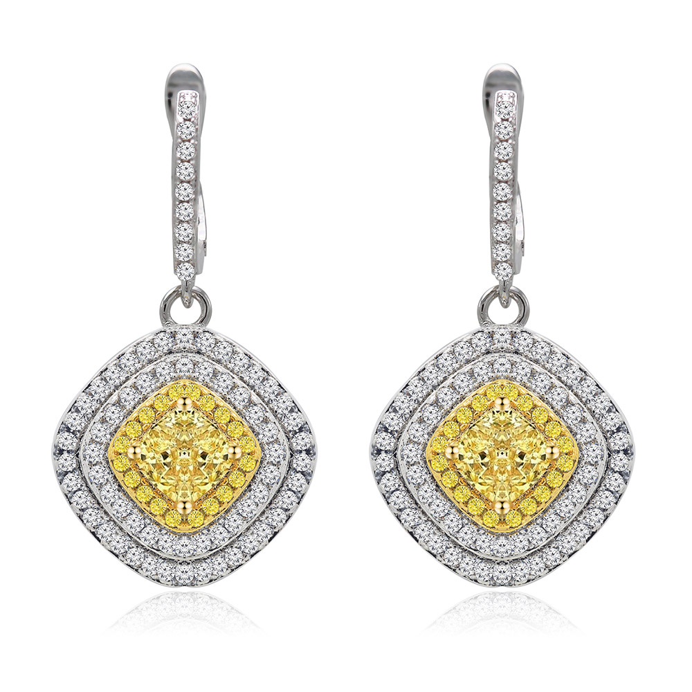 A pair of cushion shape stud earrings made of silver metal, featuring a large yellow center gemstone surrounded by smaller white and yellow diamonds. Model BEP02-RG-Z-00140.