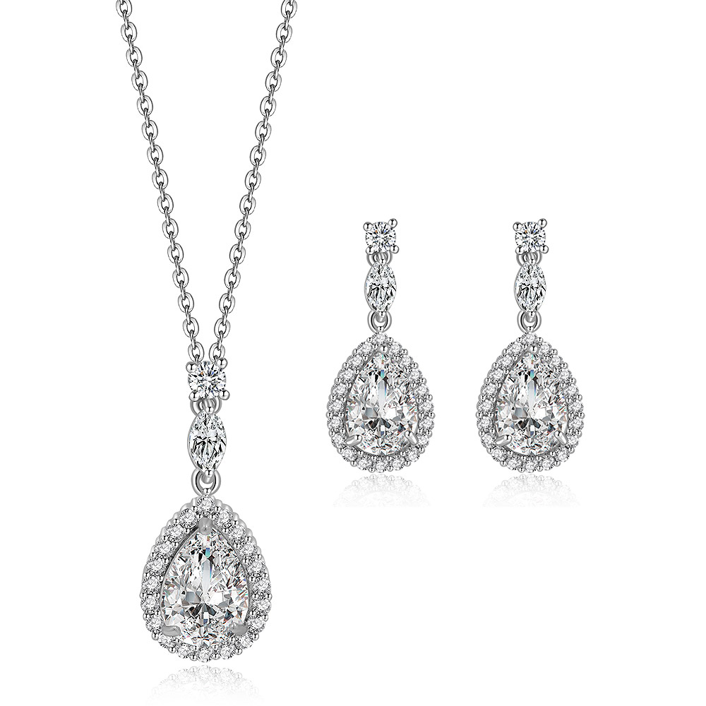 A complete Pear Drop Pave Cubic Zirconia jewelry set, showcasing the teardrop pendant necklace and matching earrings against a white background.