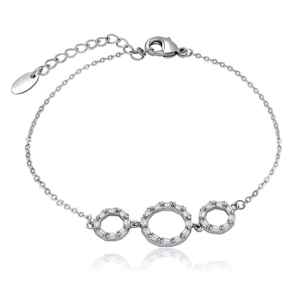 A studio shot of the Baguette CZ Circle Charm Bracelet, highlighting its silver-toned metal and clear baguette-cut stones set in circular charms.
