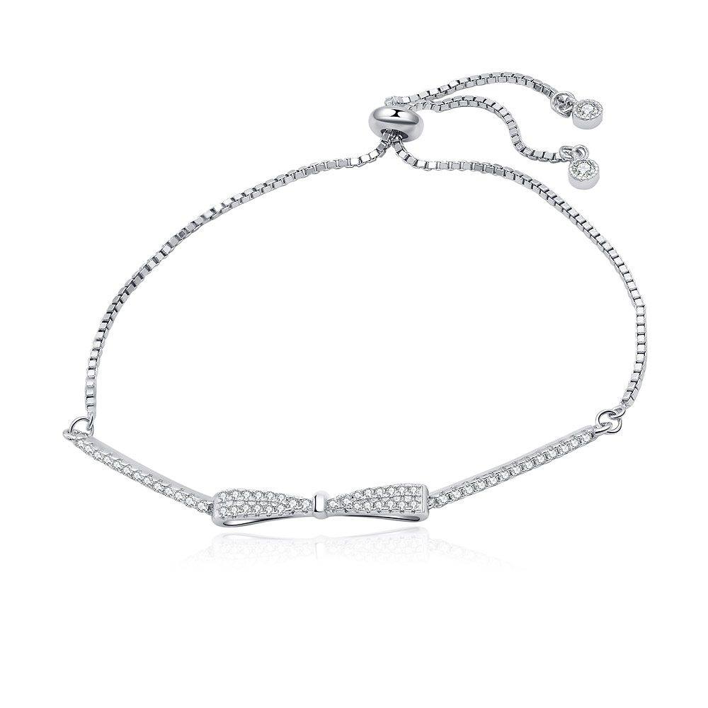 A close-up of the Sterling Silver Pave Bow Bolo Bracelet, showcasing the intricate bow design adorned with sparkling cubic zirconia stones and its adjustable sliding clasp on a clean white background.