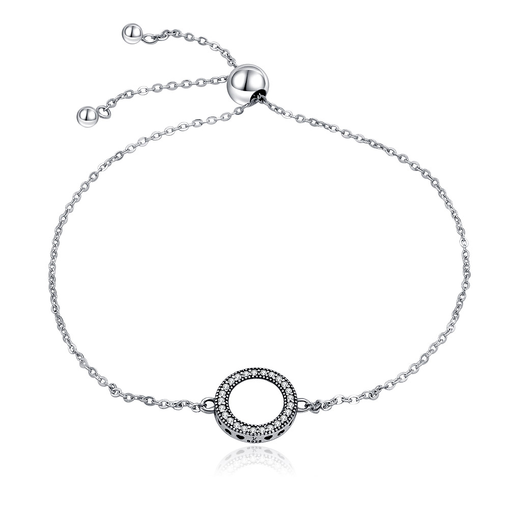 A delicate Circle Halo CZ Pave Bracelet in 925 Sterling Silver, featuring a circular pendant with sparkling cubic zirconia stones on a thin chain.