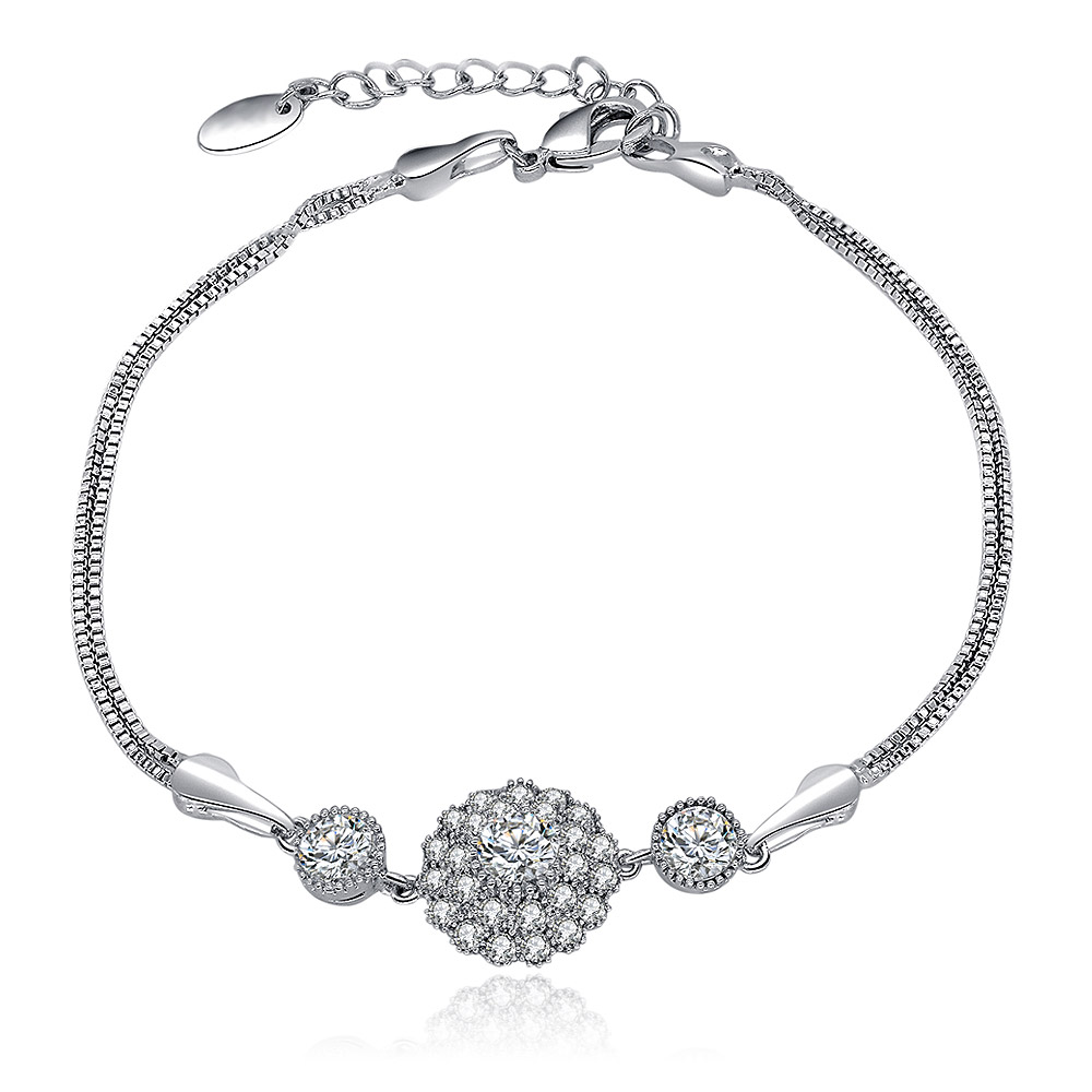 CZ Sunburst Charm Box Snake Chain Bracelet in rhodium-plated brass, featuring a central cubic zirconia sunburst charm and side stones, displayed on a white background.