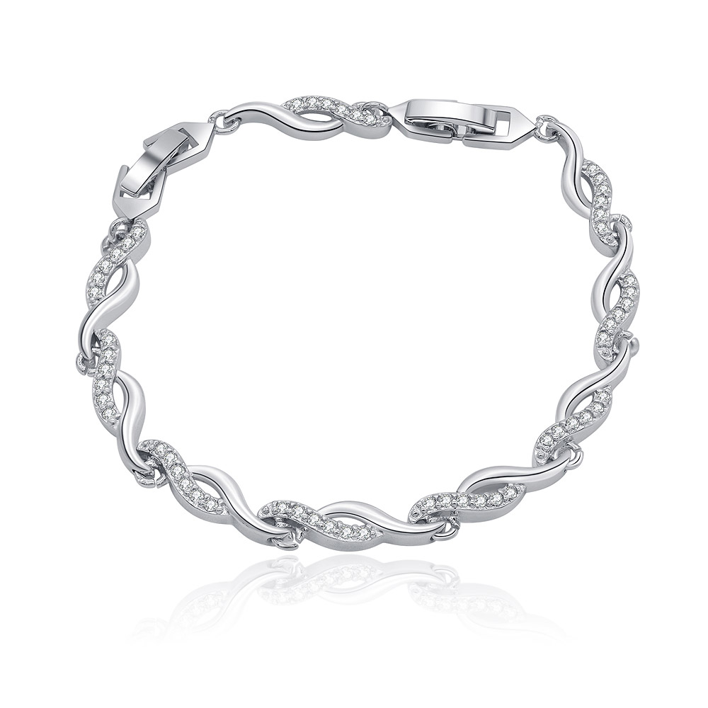 The CZ Wave Link Bracelet in rhodium-plated brass, featuring a delicate twisted design with sparkling cubic zirconia stones on a white background.