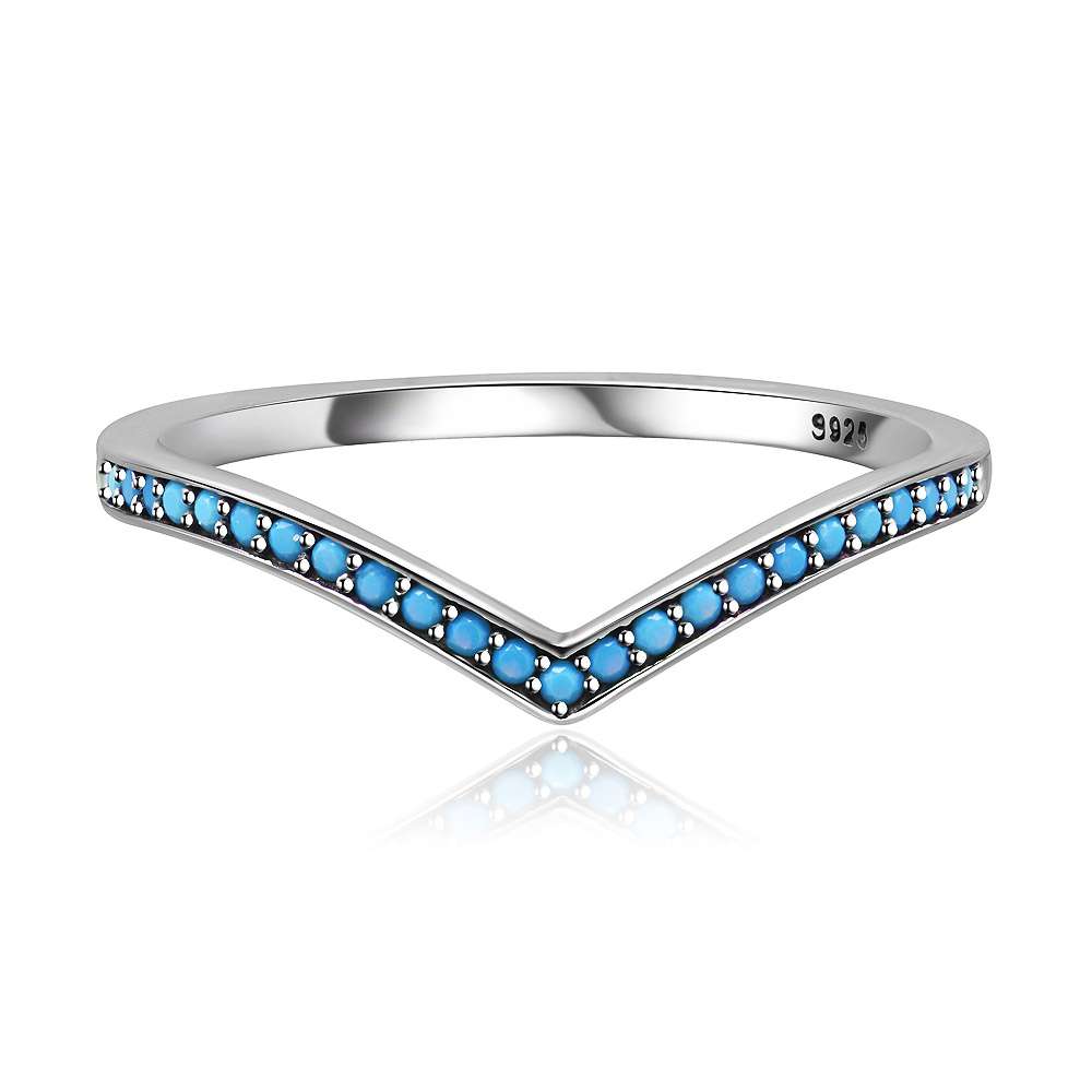 A stylish Turquoise CZ Chevron Ring made from 925 sterling silver, featuring a V-shaped design with vibrant blue gemstones.