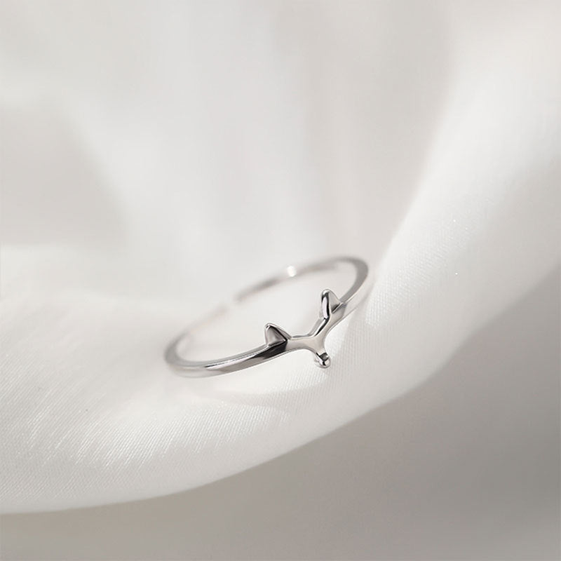 A 925 sterling silver resizable ring with a delicate wishbone design, part of a set of 5 assorted rings.