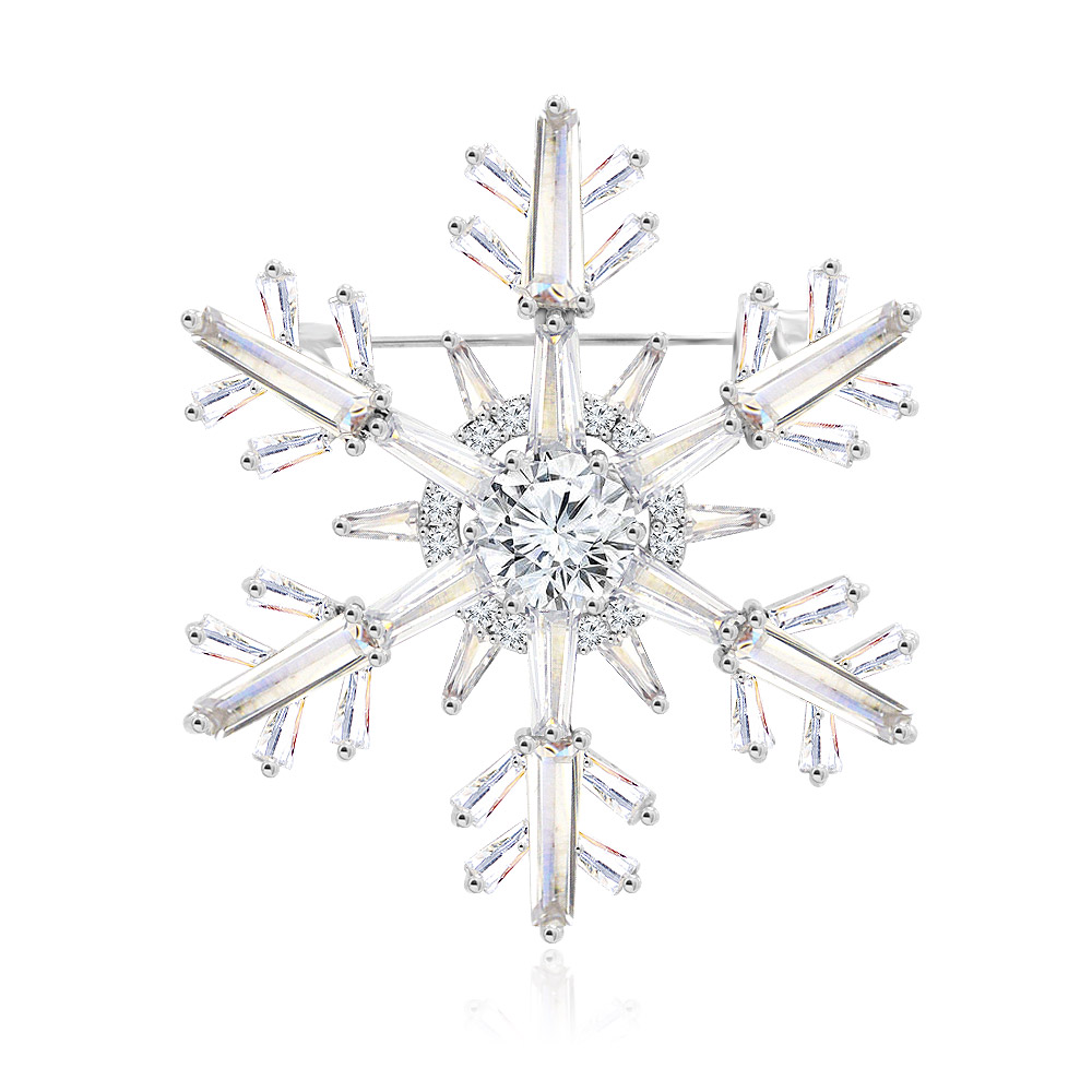 A detailed front view of the rhodium-plated snowflake brooch, intricately designed with sparkling white cubic zirconia stones.
