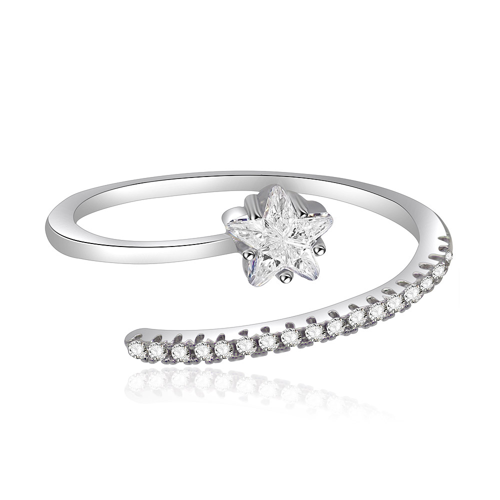 A close-up view of the Stackable Solitaire Princess-Cut Star Ring, showcasing its unique star-shaped cubic zirconia centerpiece and the delicate rhodium-plated brass band.