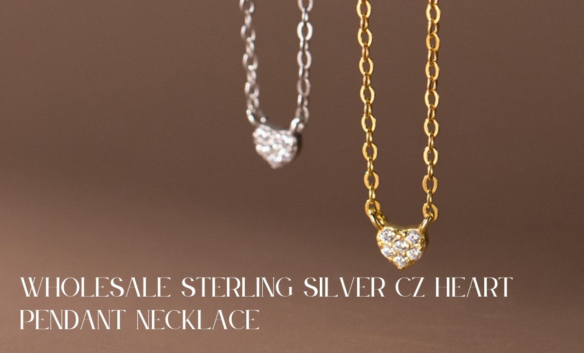 Wholesale sterling silver CZ heart pendant necklaces available in both gold and silver finishes, perfect for boutique jewelry suppliers.