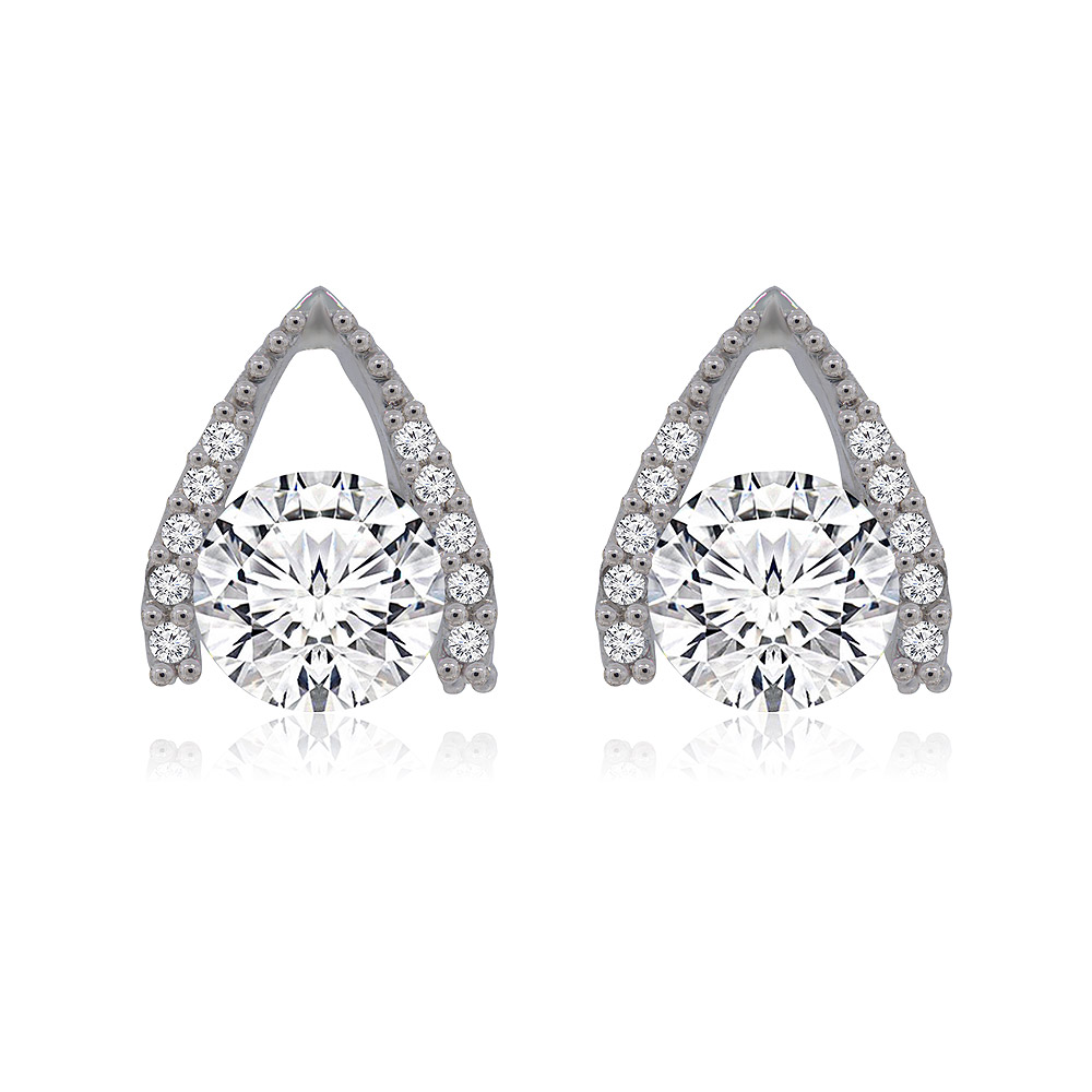 A close-up of the Hug CZ Stud Earrings, showcasing their teardrop design with a brilliant central cubic zirconia stone surrounded by smaller pavé stones, all rhodium-plated.