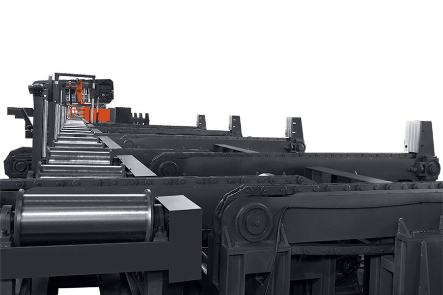 Cosen’s transfer conveyor system works in line with infeed and outfeed tables and allows multiple material loading and unloading.