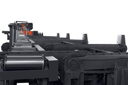 Bandsaw Integrated with Infeed/Outfeed Transfer Conveyor System - Cosen’s transfer conveyor system works in line with infeed and outfeed tables and allows multiple material loading and unloading.