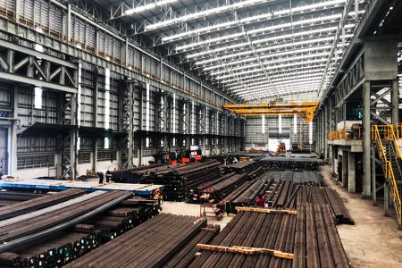 Steel Plant Production Line with Three Saws Simultaneously Cutting - Profiles are produced and trimmed to length directly at steel plant to optimize supply chain cost savings.