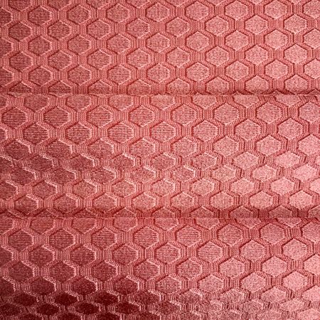 Jacquard elastic fabric, also known as jacquard lycra fabric, is to weave patterns and colors on the fabric surface