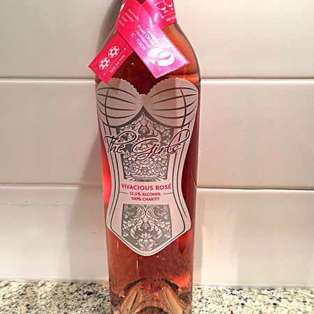 Custom-shaped wine labels with red foil stamping for a distinctive, premium look.