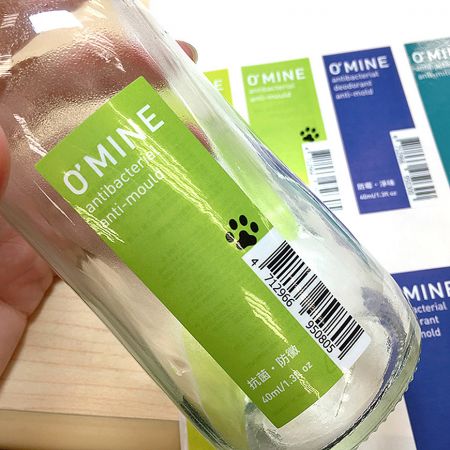 Double-sided printed sticker with product information on both front and back.