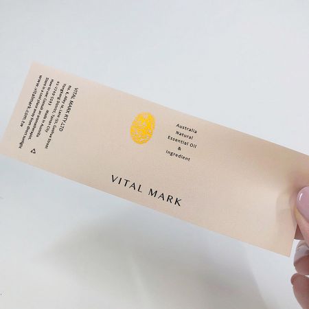 Two-color printed sticker with black foil stamping