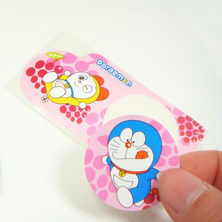 Bottom layer is also a sticker — collectible and functional.