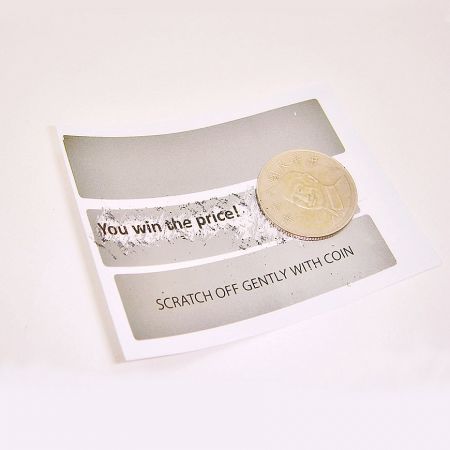 A single layer of black ink is printed over the Scratch-Off Ink Sticker, revealing hidden information when scratched.