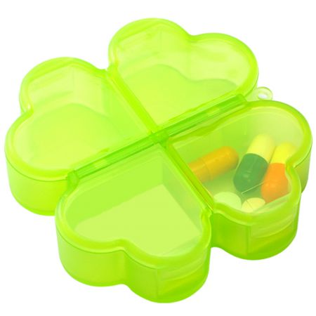 Boîte à pilules transparente 4 fois par jour.