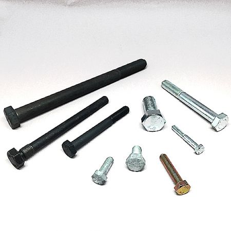 Bolts - A collection of various industrial bolts, including hex head and flange bolts, manufactured by THREAD Industrial.
