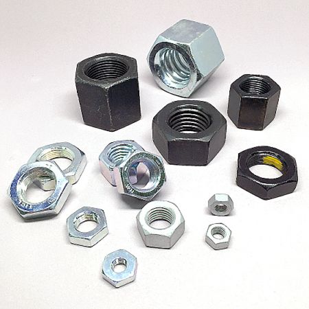 Nuts - A collection of various industrial hex nuts manufactured by THREAD Industrial.