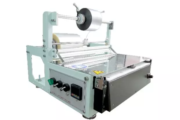 Máquina de envoltura manual (tipo mesa)