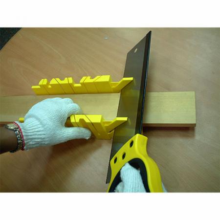 Tenon saw with miter box for making cuts on 90 degree angle.