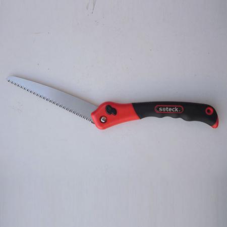 Soteck super-sharp folding saw open for cutting branches overhead.