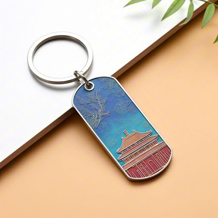 Portachiavi in metallo stampati in 3D UV su design personalizzato.