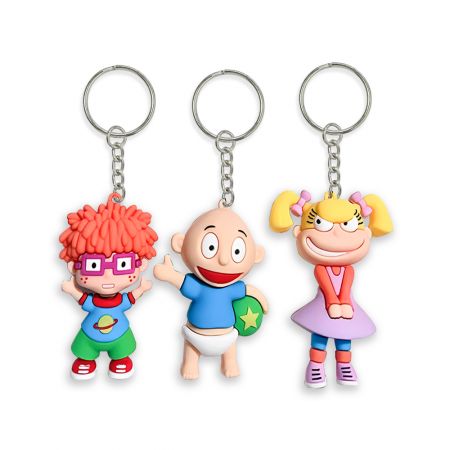 Portachiavi in gomma con personaggio cubico personalizzato. - Portachiavi in gomma con mascotte del marchio.