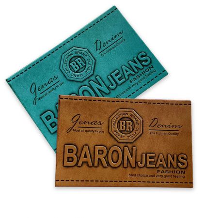 エンボス加工されたデザインとベルクロバック付きのカスタマイズレザーラベル。