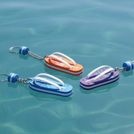 Maßgeschneiderte schwimmende Schlüsselanhänger für Boote.