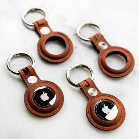 Лучшие варианты персонализации кожаных брелков Airtag.