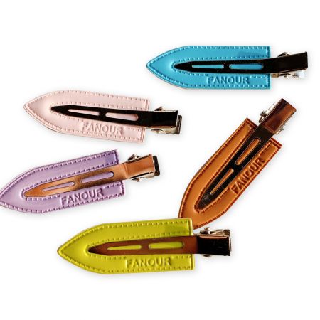 Großhandelspreise für individuelle Leder-Haar-Snap-Clips.