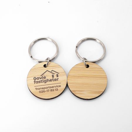 Llaveros de madera personalizados ecológicos.