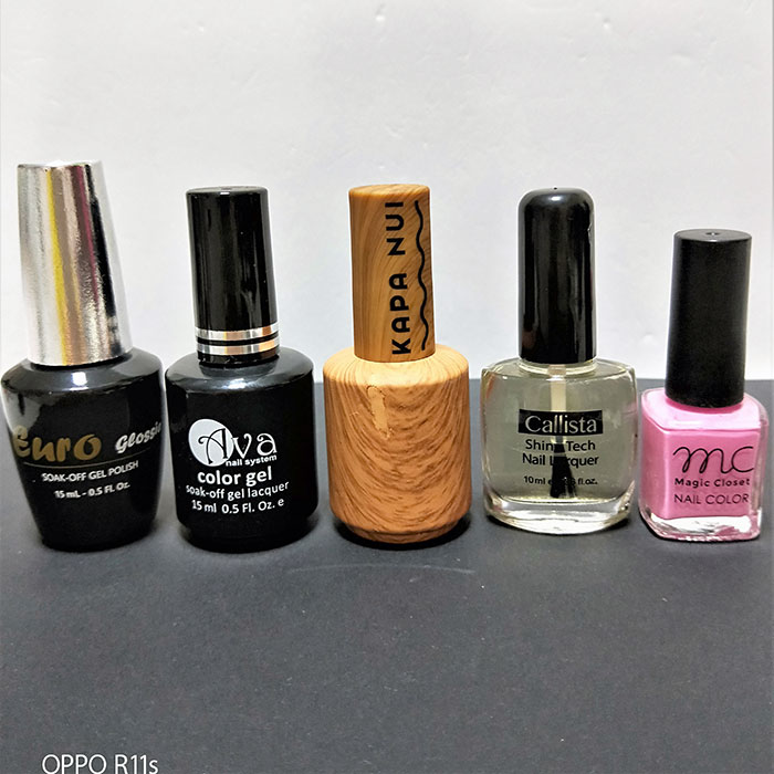 Logo stampato su bottiglie e tappi per smalto