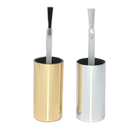 gold and silver aluminium cover with brush