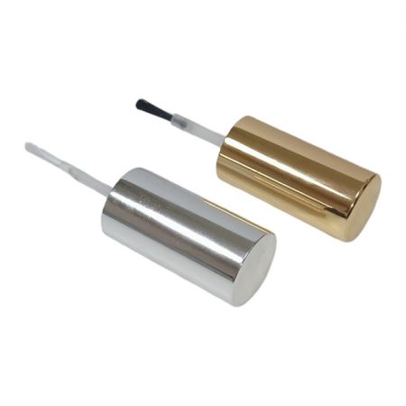 gold and silver aluminium cover with bristle brush