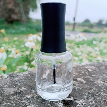 Botella de esmalte de uñas de vidrio redonda de 15 ml con tapa y pincel personalizados